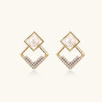 Gold-plated double square frame earrings with freshwater pearl and crystal accents on white background