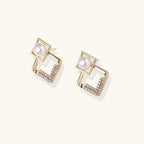 Gold-plated double square frame earrings with freshwater pearl and crystal accents on white background